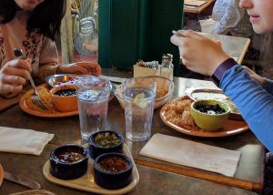 Two girls eating together