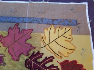 Falling Leaves art quilt sandwiched for quilting
