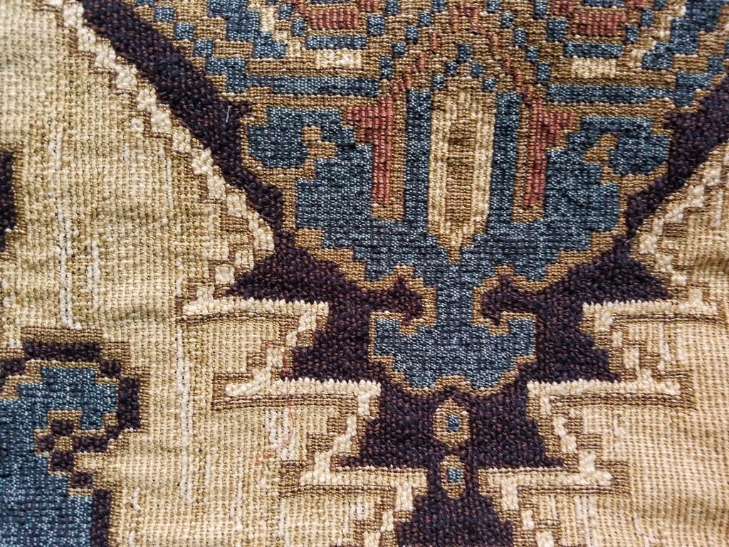 Beautiful, rich blue and beige fabric swatch