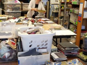 Sorting rescued fabric samples at FabMo