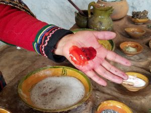 Lime added to red pigment