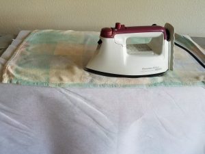 Ironing heavy interfacing onto new market totes