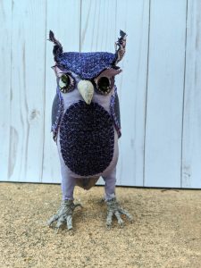 Purple textile owl, front view