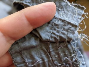Unpicking pants for mixed media art