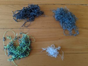 Unpicking pants for mixed media art