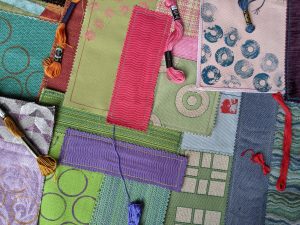Colorful cloth collages and thread