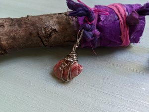 Brush handle with charm