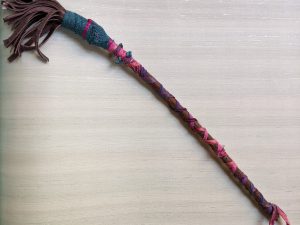Leather and stick brush