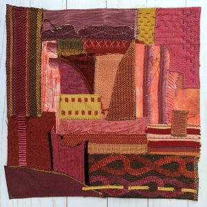 Warm colored fabric collage