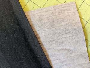 Fusible web ironed on black fabric