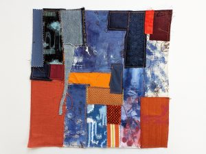 Fabric collage in blue and orange
