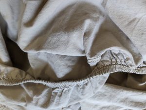Torn bed sheet