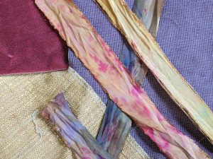 Ochre ribbon and fabrics