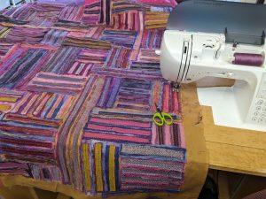 Sewing a quilt on a sewing machine