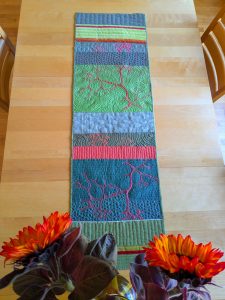 Algae quilt/table runner on the table