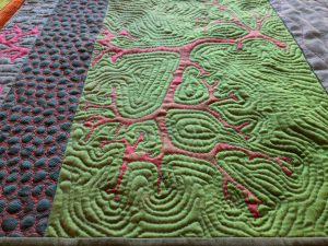 Detail of algae quilted table runner