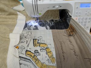 "The Builder of Jerusalem" quilt under the sewing machine