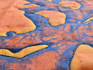 "Yaacov's Algae in Orange" quilt detail