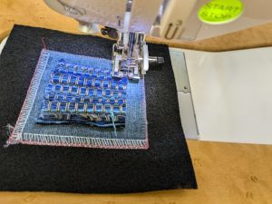 Machine sewing fabric squares