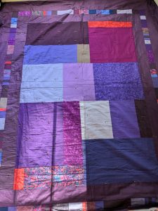 Basted bed quilt